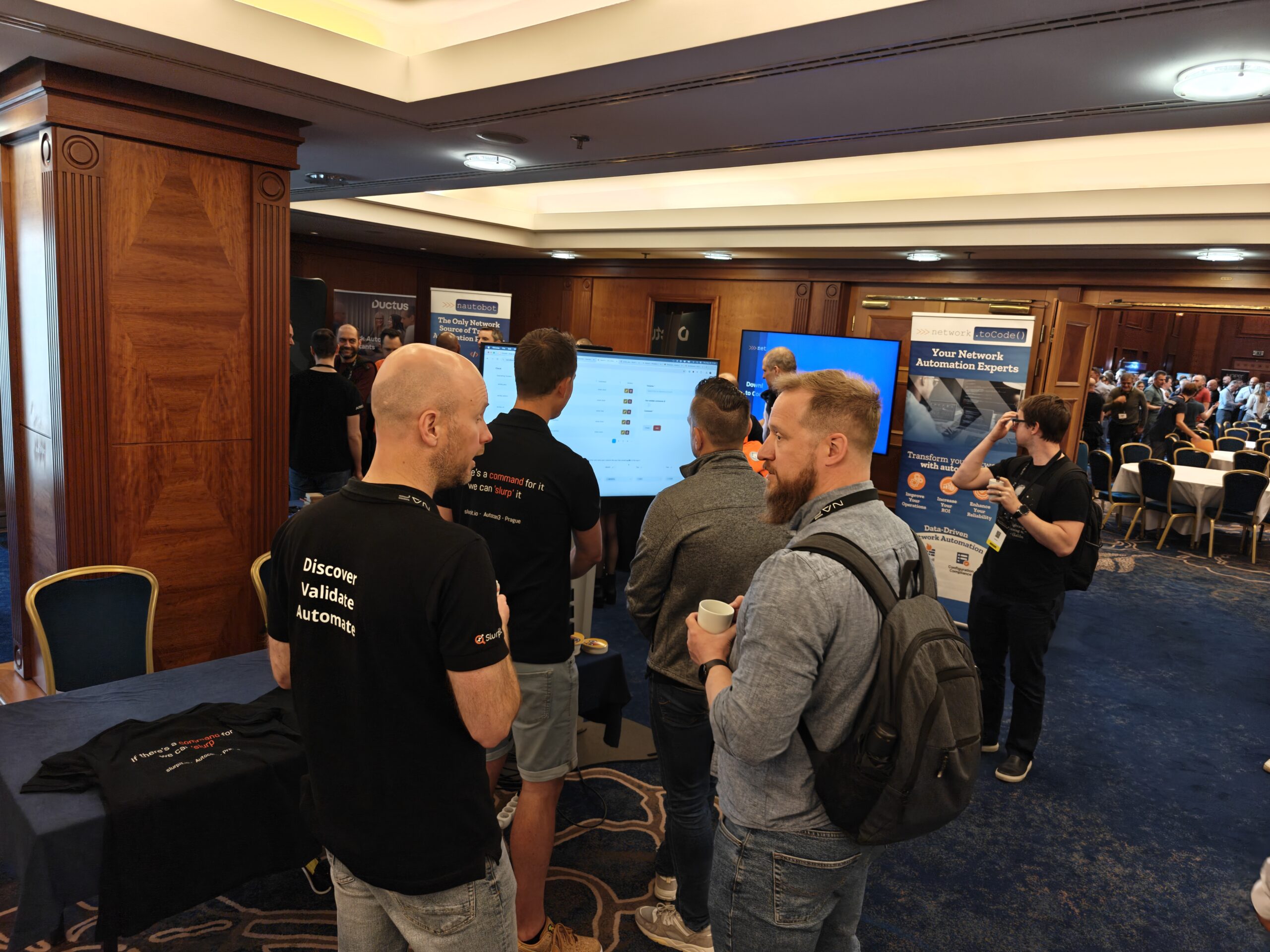 Slurpit and Netpicker team at a network automation event